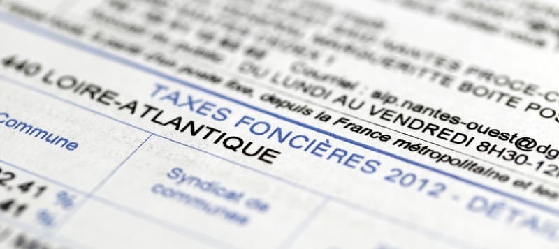 qui paye la taxe foncière