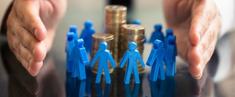 Protecting Blue Human Figures Surrounding Stacked Coins