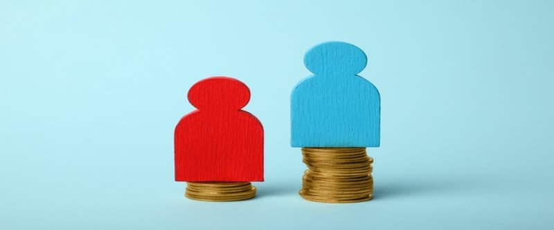  Inequality people income gap. Gold coins on scales.